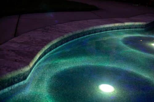 close up of underwater lights in residential pool built by Orange County pool contractors