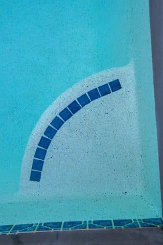blue tile on pool steps