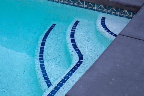 blue tile accent ideas in pool