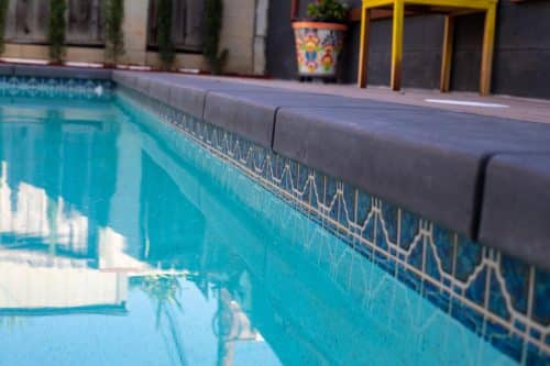 blue tile accents in california pool