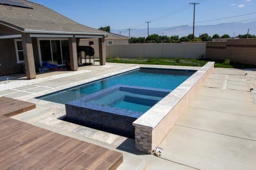 Los Angeles residential swimming pool design with wood deck