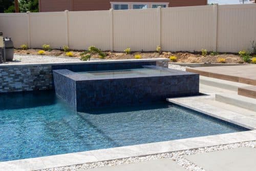 Temecula backyard pool design with built-in spa