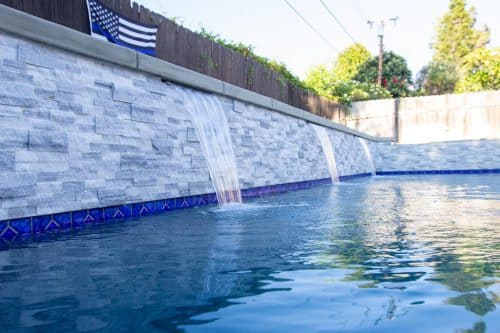 Chino Hills pool with bright blue tiling accents
