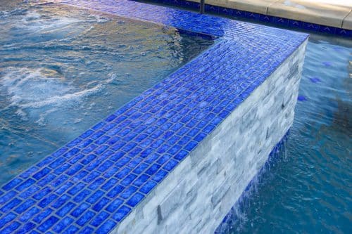 Pool Icons spa design with bright blue tiling
