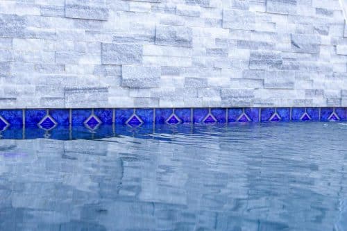 luxury swimming pool with blue tiling