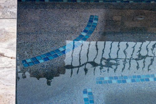 blue tiles in luxury swimming pool