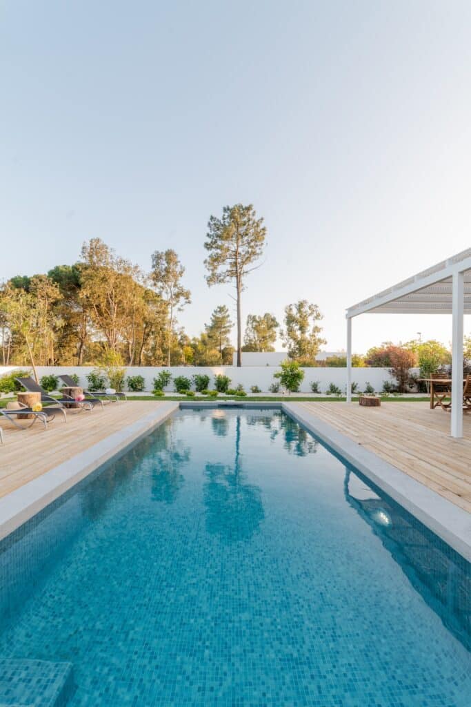 beautiful backyard pool built by custom pool builders