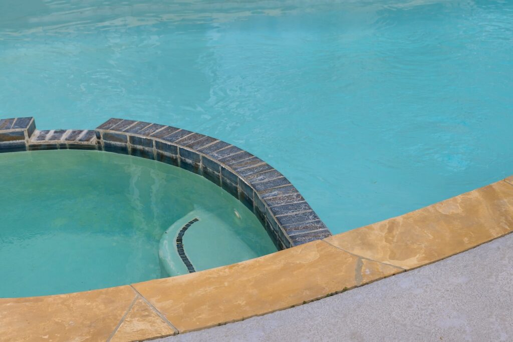 hot tub pool combo in backyard