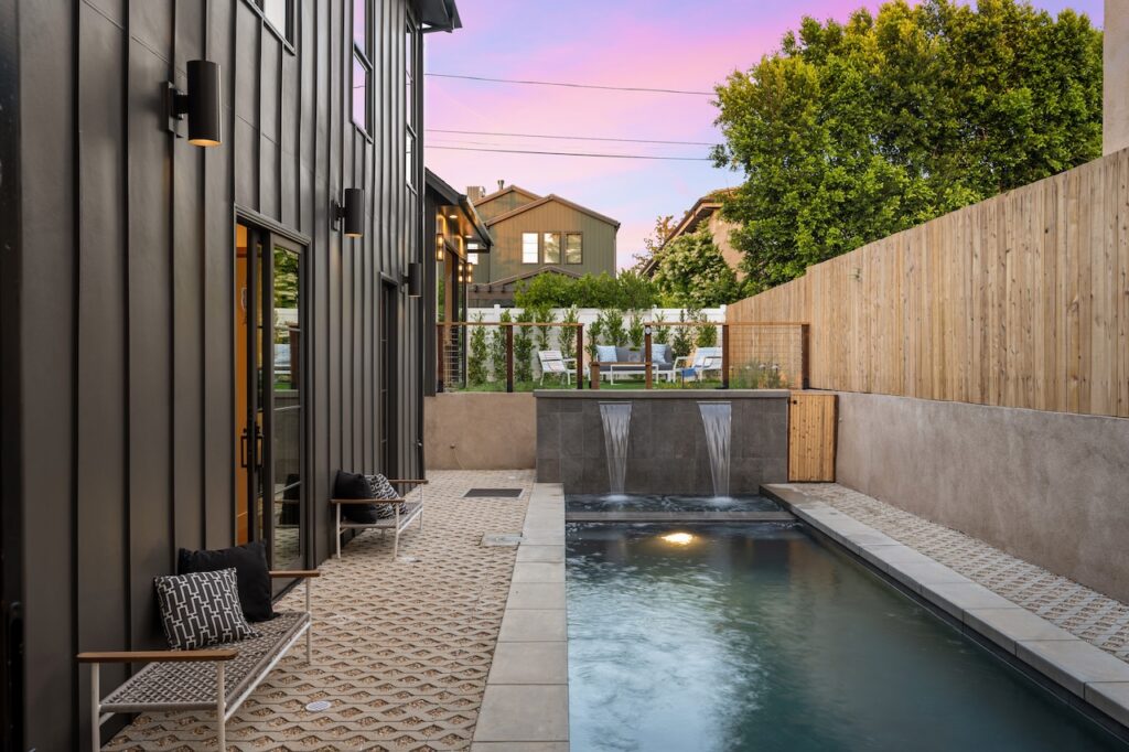 A modern backyard pool with a sleek design